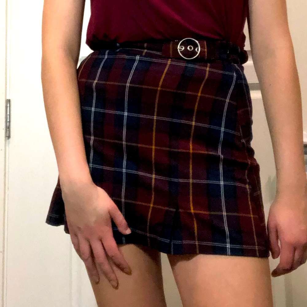 This is a plaid mini skirt, with a cute belt.